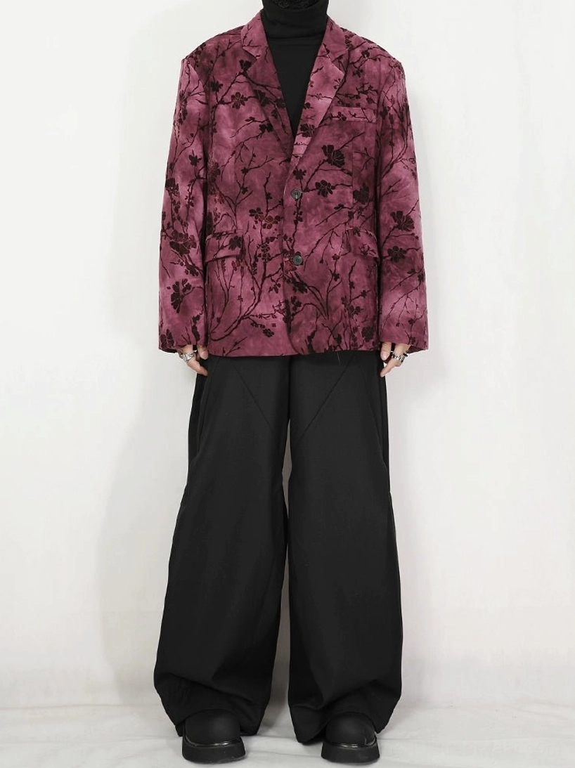 Front full body darkwear styling with pink purple floral velvet blazer black turtleneck and black trousers