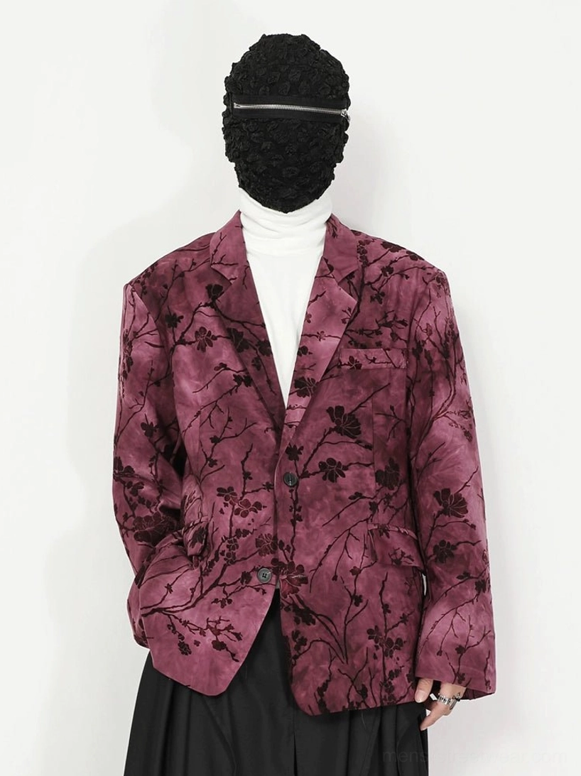 Pink purple floral velvet blazer with two button closure and notched lapel in a relaxed avant-garde tailored outfit
