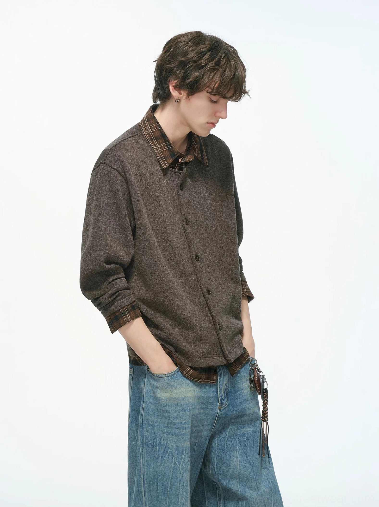 Brown plaid collar knit shirt jacket shown from a right three-quarter angle with blue wide-leg jeans in relaxed Seoul streetwear style