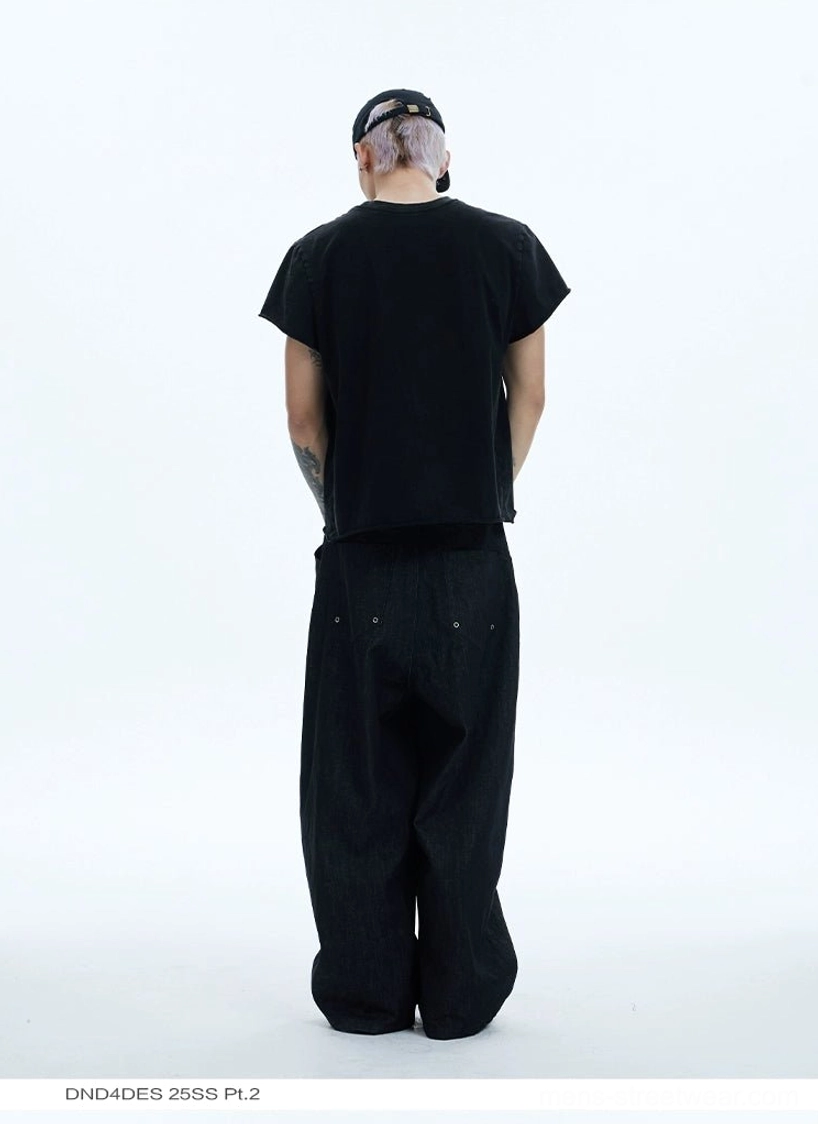 Plain black crewneck T-shirt back view styled as a minimal Korean streetwear wardrobe essential