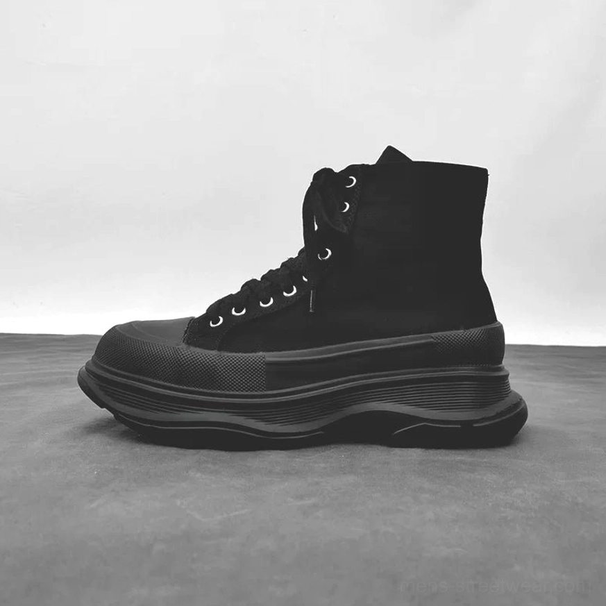 Platform canvas sneakers in black and white streetwear styling with chunky sole lace-up closure and high-top options