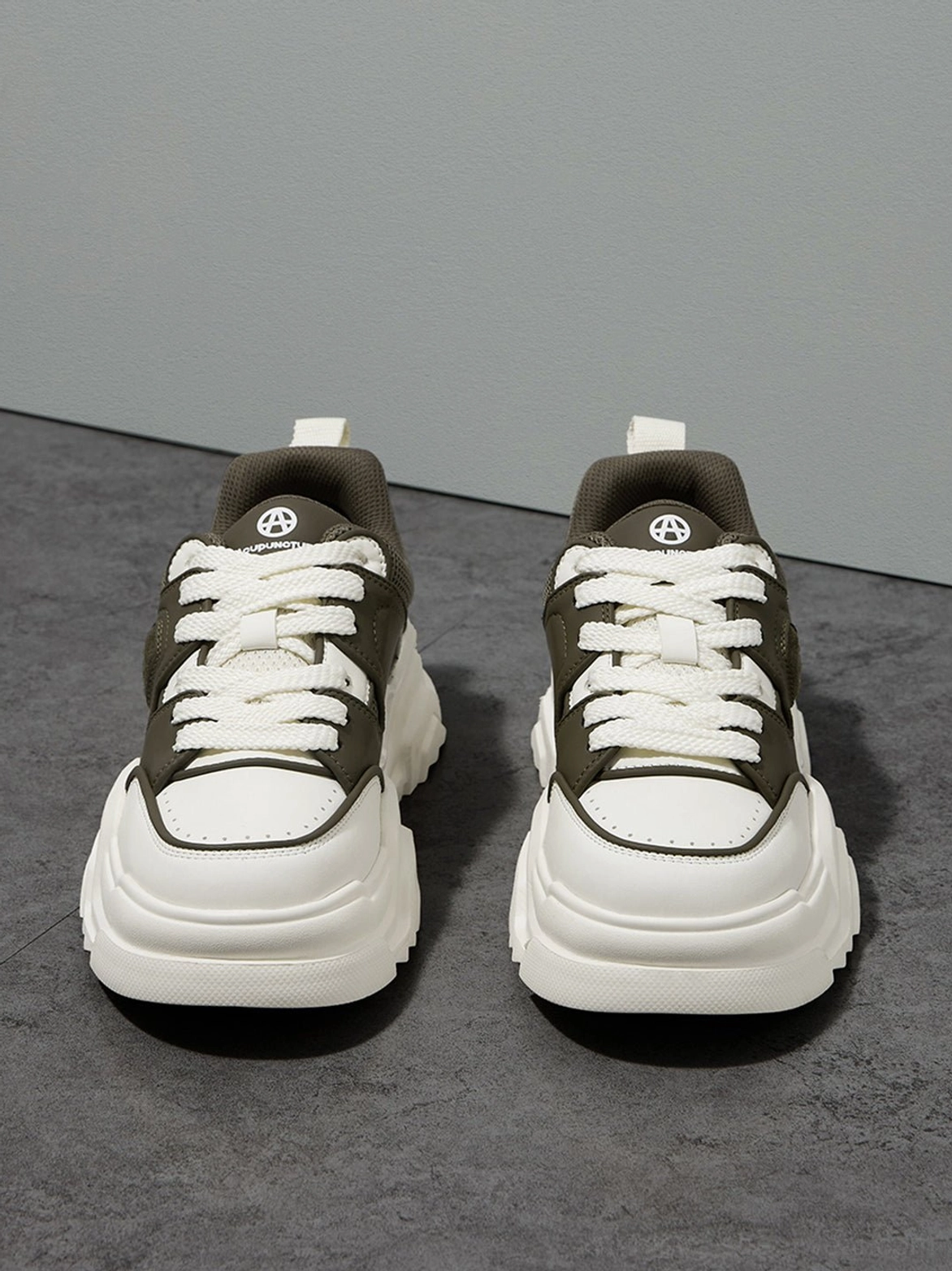 Platform sneaker detailed stitching macro view showing thread precision contrast color blocking construction excellence and durability design