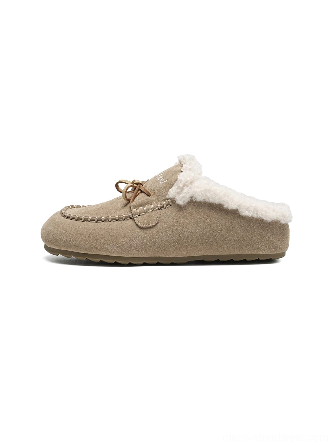 Sand color plush-lined suede-look moccasin slippers in right side profile with flat slip-on sole