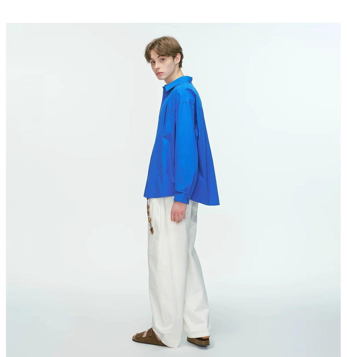 Clean pointed-collar poplin shirt with single chest pocket and effortless oversized mens street style design