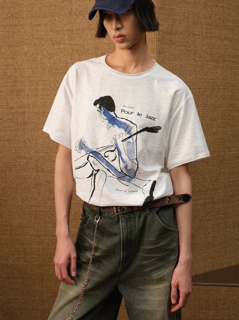 White Pour Le Jazz slub cotton cropped graphic T-shirt with blue jazz musician sketch worn with vintage wide-leg jeans