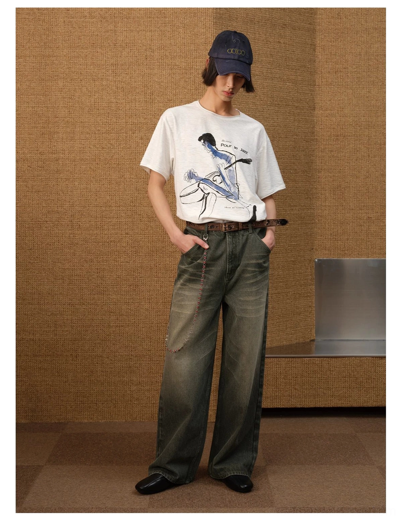 Side front view of white slub cotton jazz graphic T-shirt with cropped relaxed silhouette and vintage streetwear styling