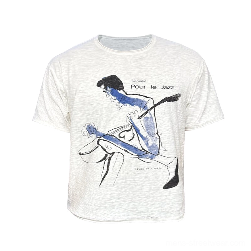 Flat lay of white Pour Le Jazz crewneck graphic T-shirt featuring blue hand-drawn jazz bassist print and textured slub fabric