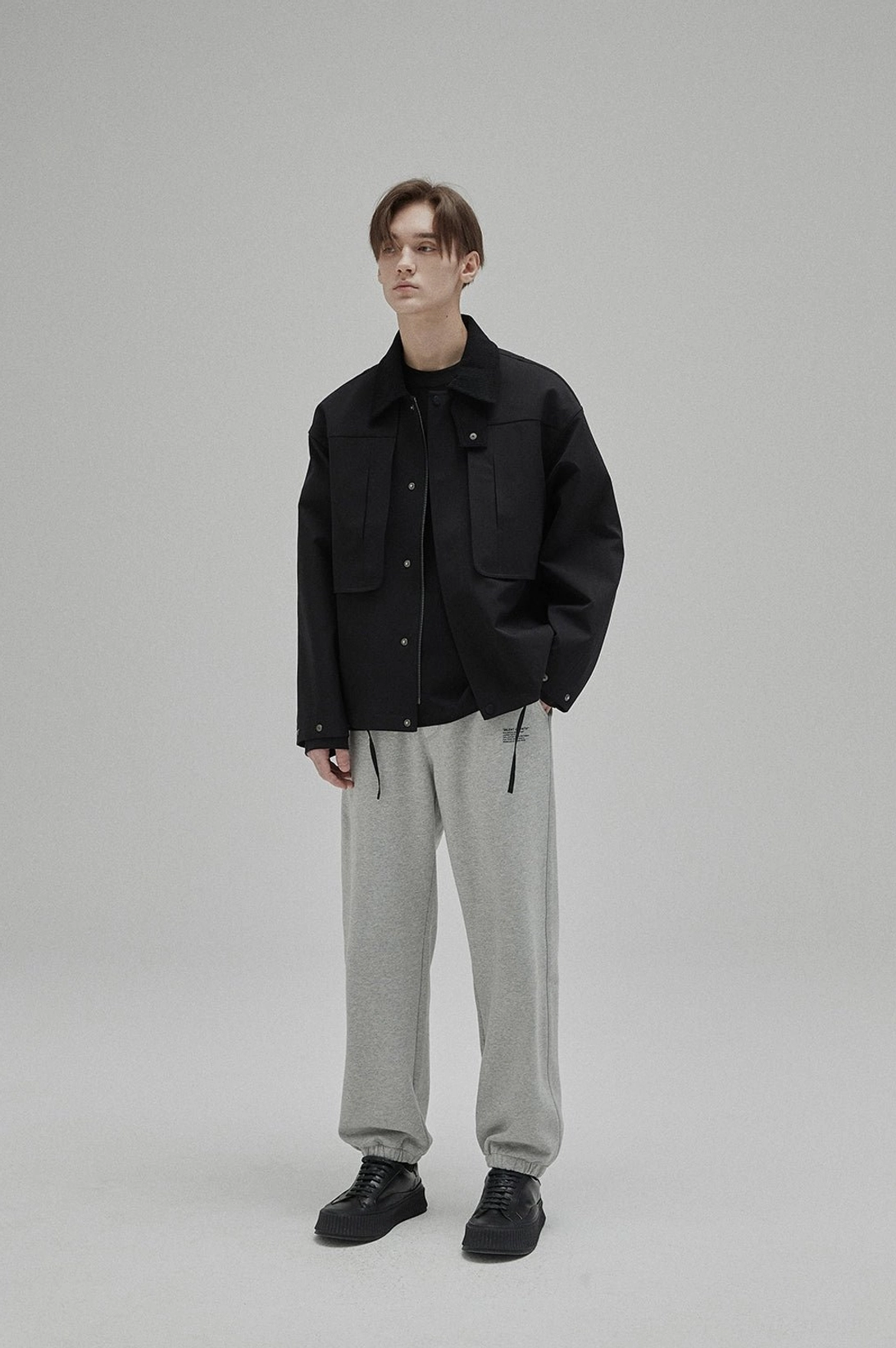 Premium minimalist crew neck tee suitable for monochrome outfits, layered looks, and daily wear