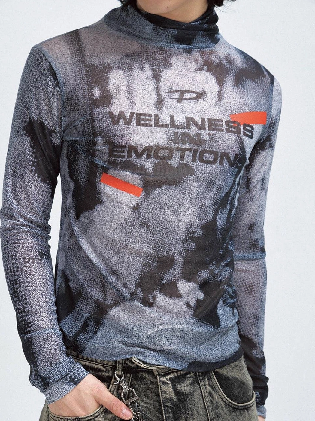 Close-up front view of the high neck and Wellness in Emotion chest slogan on a printed mesh streetwear sweatshirt