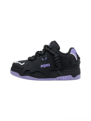 Black and purple bat graphic platform sneakers shown in left lateral view with chunky purple skate sole and bat-inspired side overlays