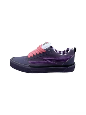 Purple gingham platform skate shoes with glossy lightning stripe, pink laces, padded collar, and chunky rubber sole on a white background