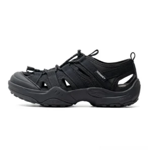 Black hybrid water hiking sandals shown from the side with closed rounded toe, breathable mesh upper, bungee lacing, side tag, and rugged anti-slip rubber outsole