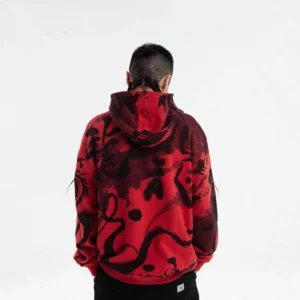 Back view of red black Chinese calligraphy graphic zip-up hoodie showing large all-over brush script artwork