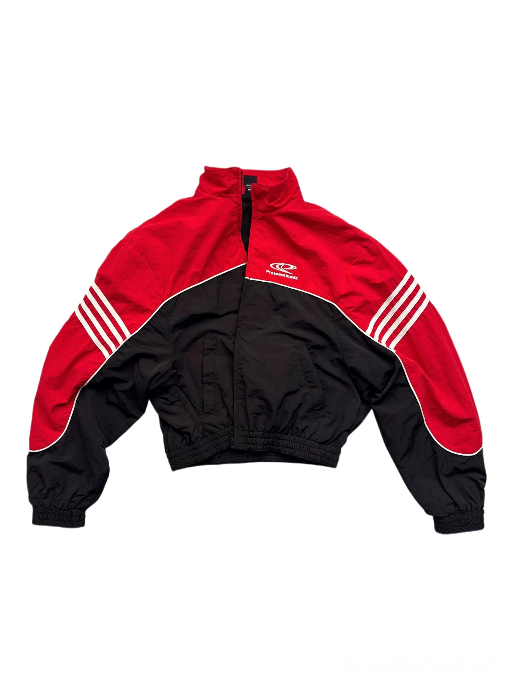 Front flat lay of red and black cropped track jacket featuring stand collar chest emblem short zipper and racing stripes