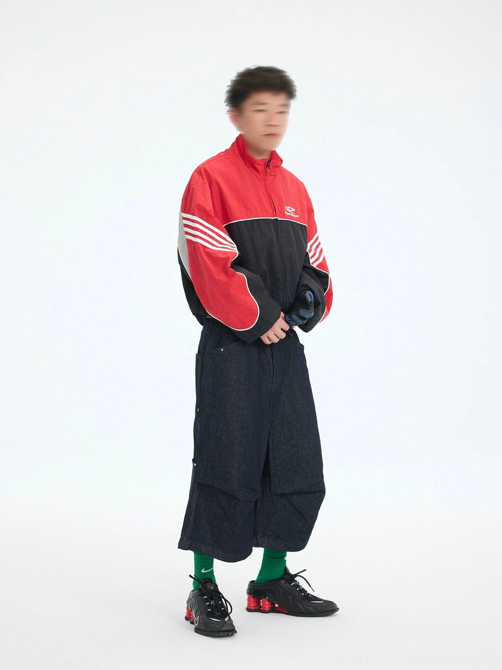 Side view of men's red black cropped nylon track jacket with contrast piping and triple white sleeve stripes