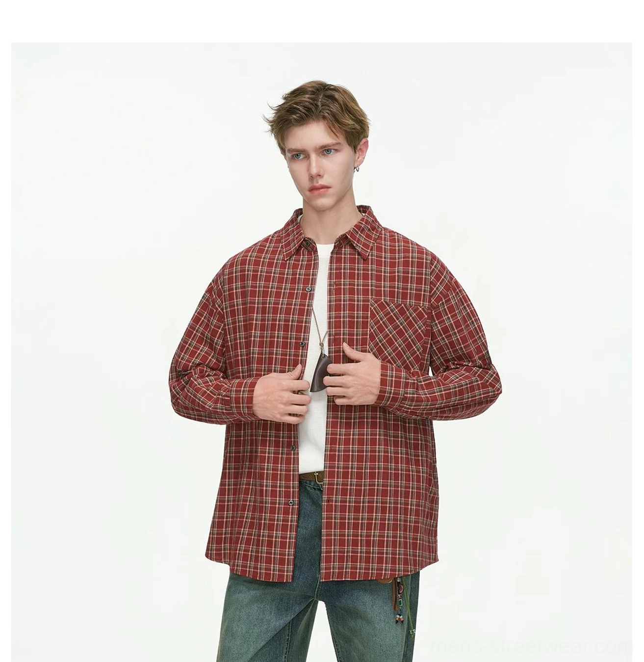 Red oversized plaid button-up shirt with spread collar front buttons and chest patch pocket detail