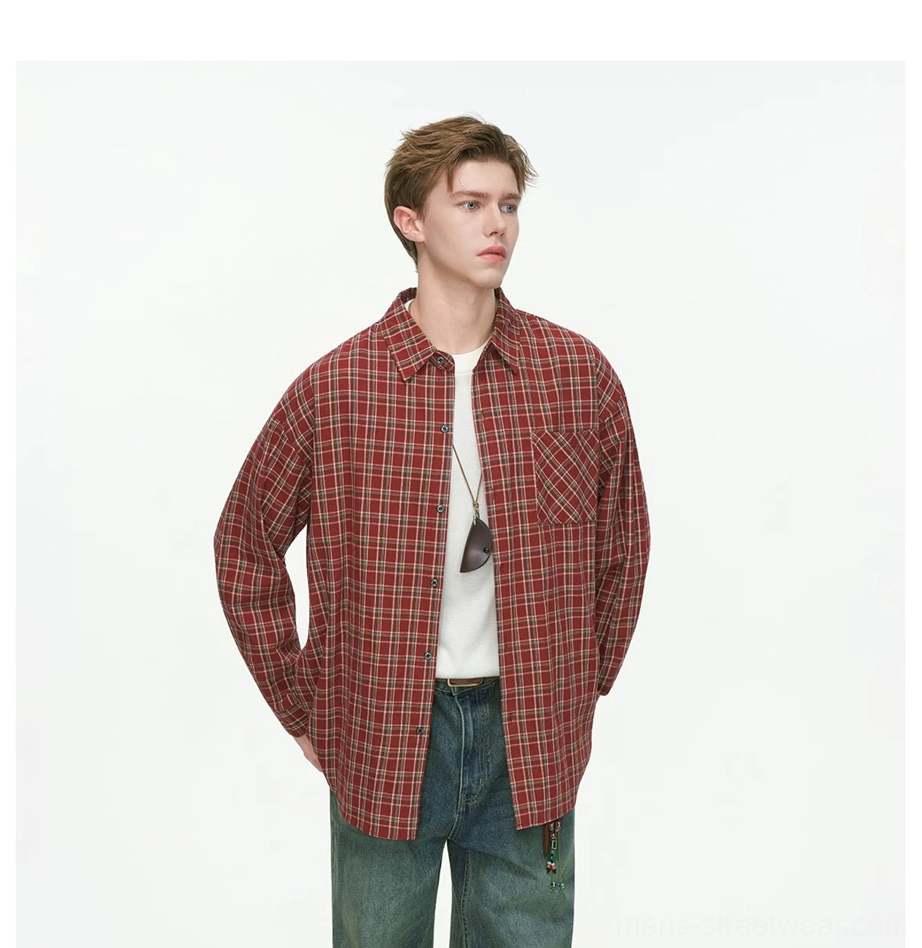 Front view of red plaid oversized long sleeve shirt with relaxed dropped-shoulder streetwear silhouette