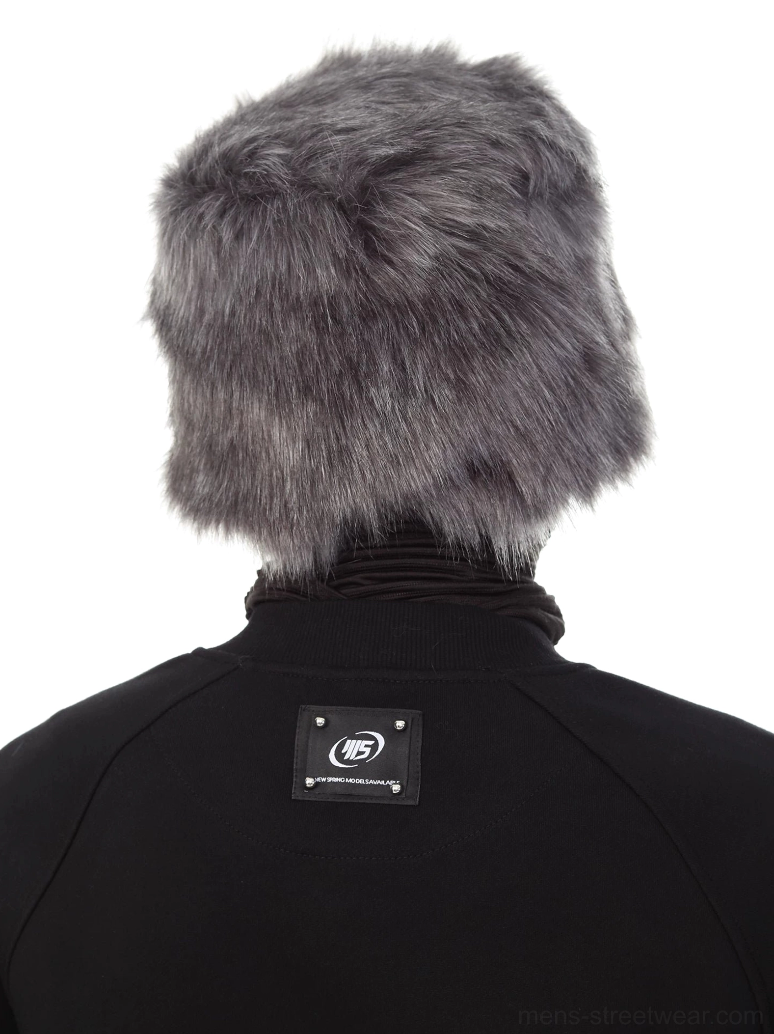 Back view of black oversized raglan crewneck sweatshirt showing ribbed collar and square back neck patch detail