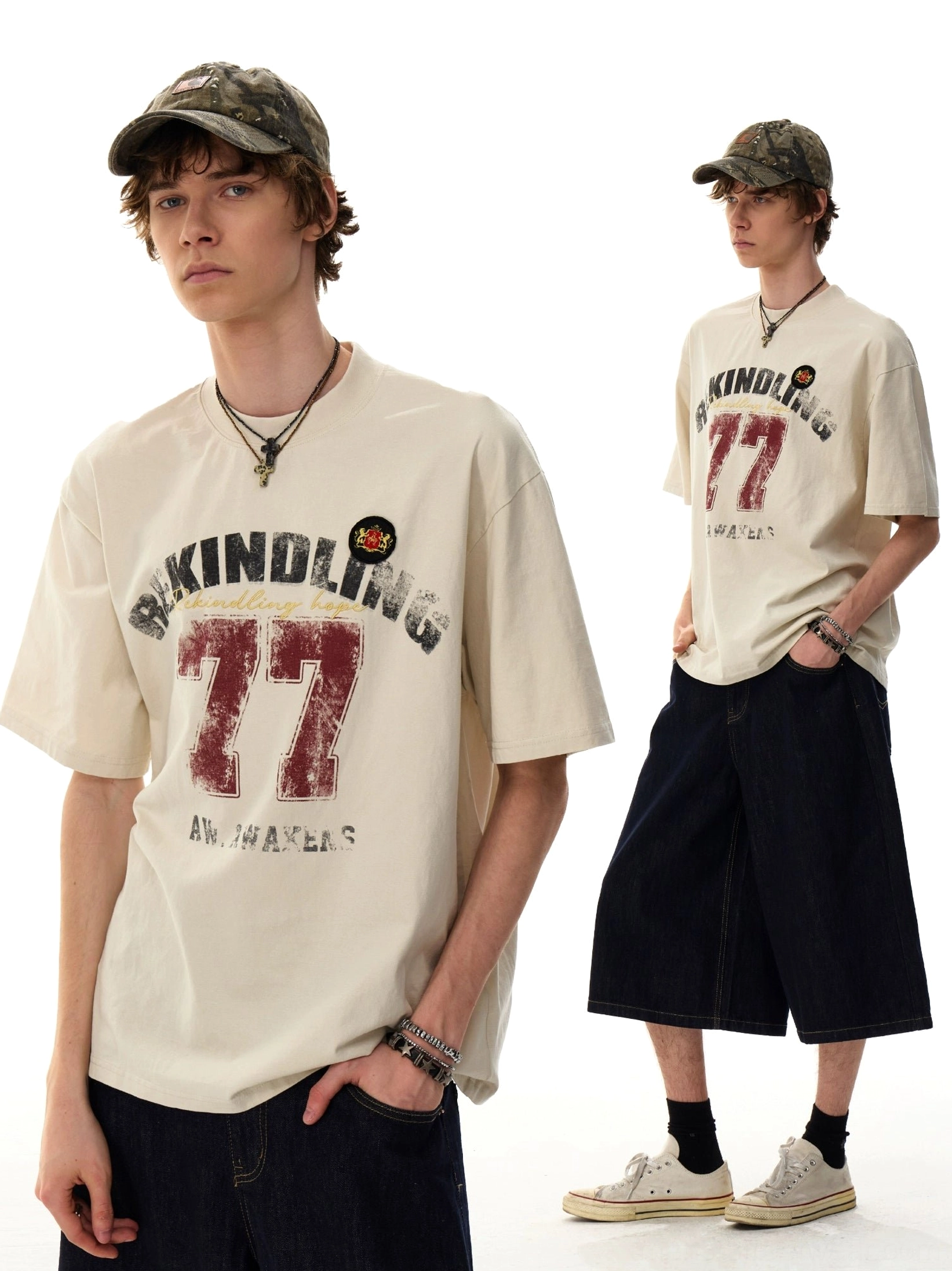 Two models wearing Apricot Rekindling 77 oversized varsity graphic T-shirts with relaxed denim streetwear styling