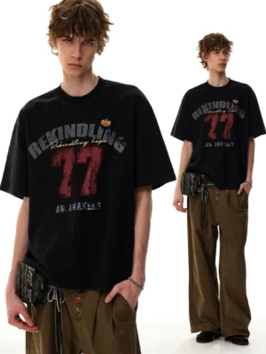 Two male models showcasing the Rekindling 77 distressed varsity graphic T-shirt in a relaxed Korean streetwear outfit