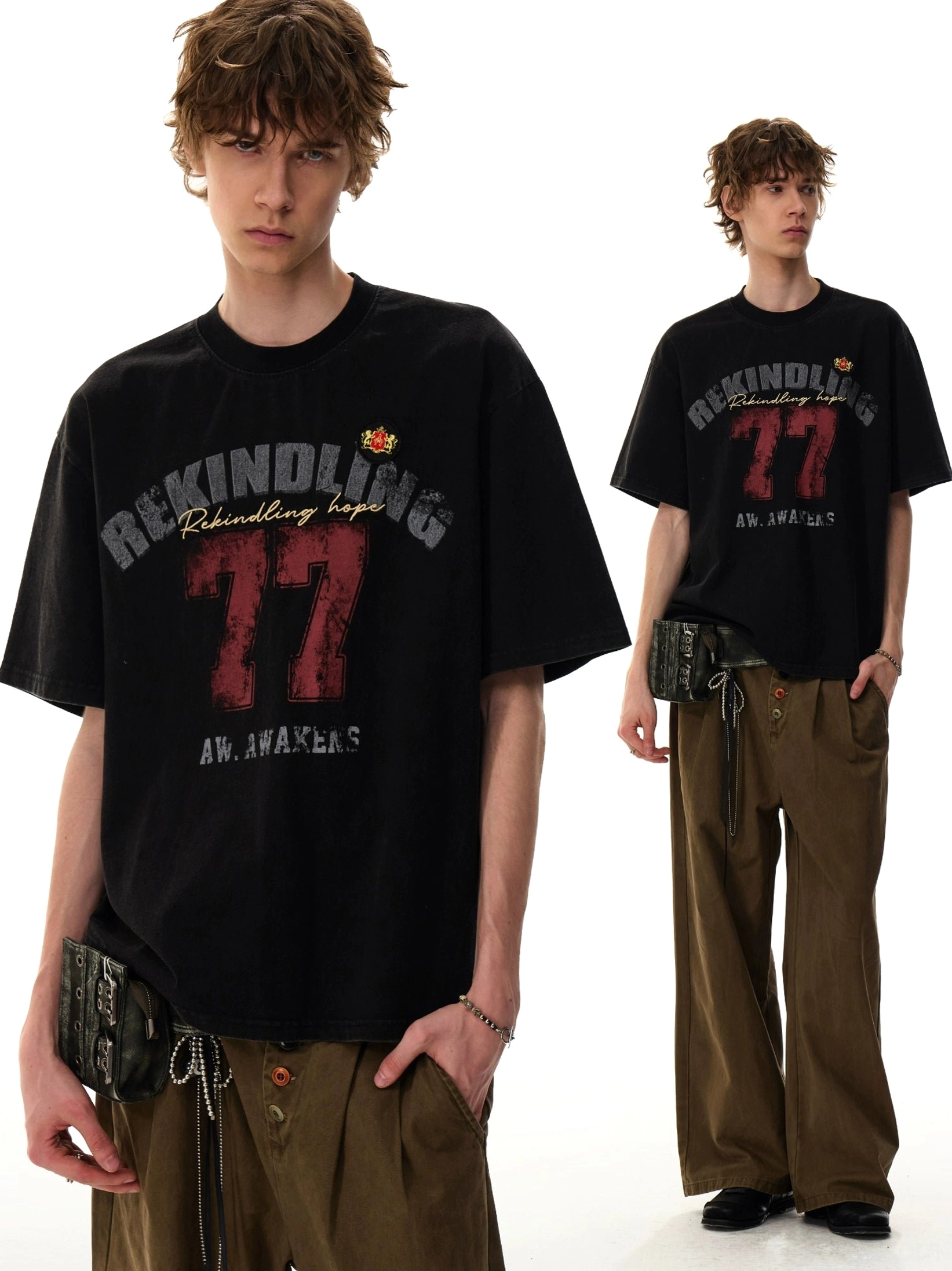 Two male models showcasing the Rekindling 77 distressed varsity graphic T-shirt in a relaxed Korean streetwear outfit