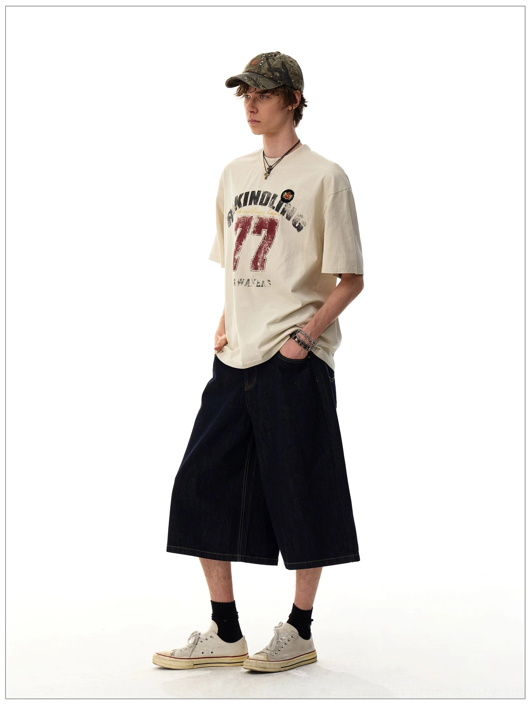 Rekindling 77 vintage varsity graphic oversized streetwear T-shirt product detail view in a relaxed cotton silhouette