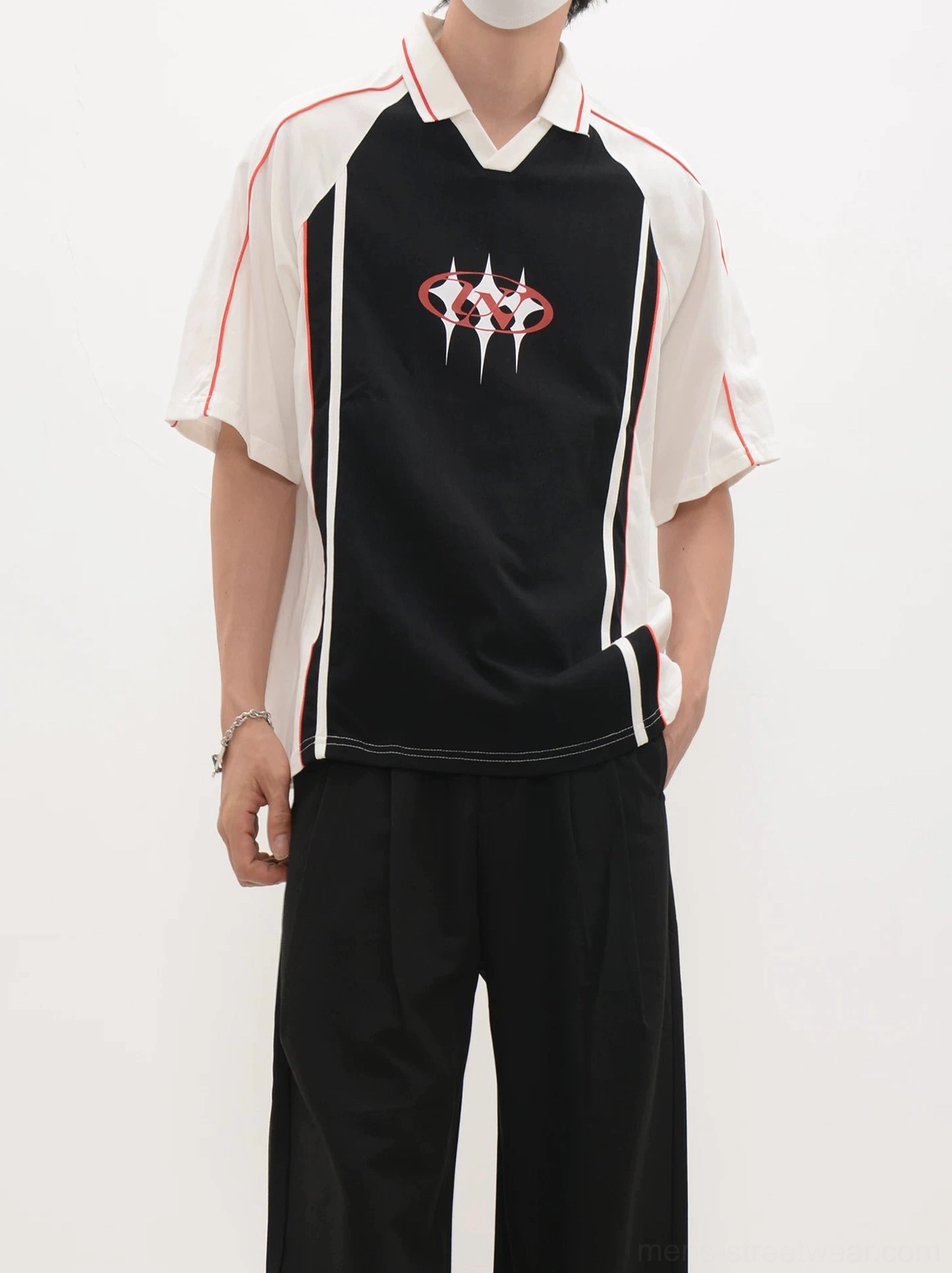 Relaxed black and white polo jersey shirt with white short sleeves, red sleeve piping, and contemporary Asian streetwear styling