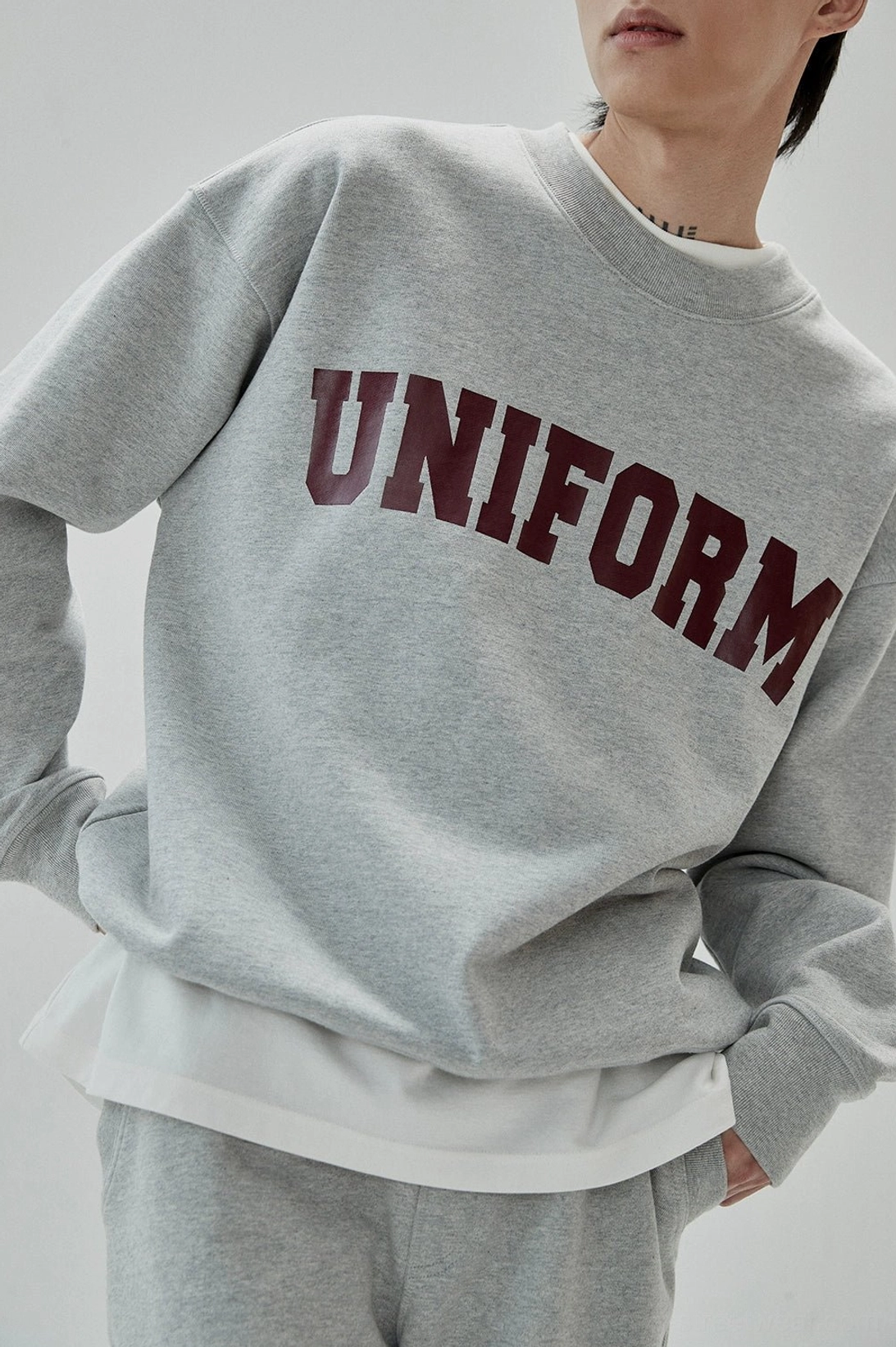 Relaxed collegiate graphic sweatshirt with ribbed neckline cuffs and hem for everyday wear