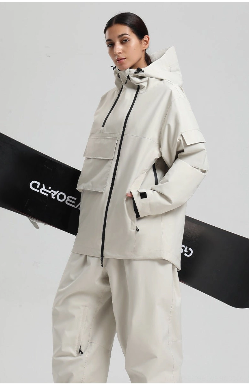 Relaxed colorblock snow jacket for men featuring a hood, high collar, wind skirt, double layer cuffs, and functional technical styling