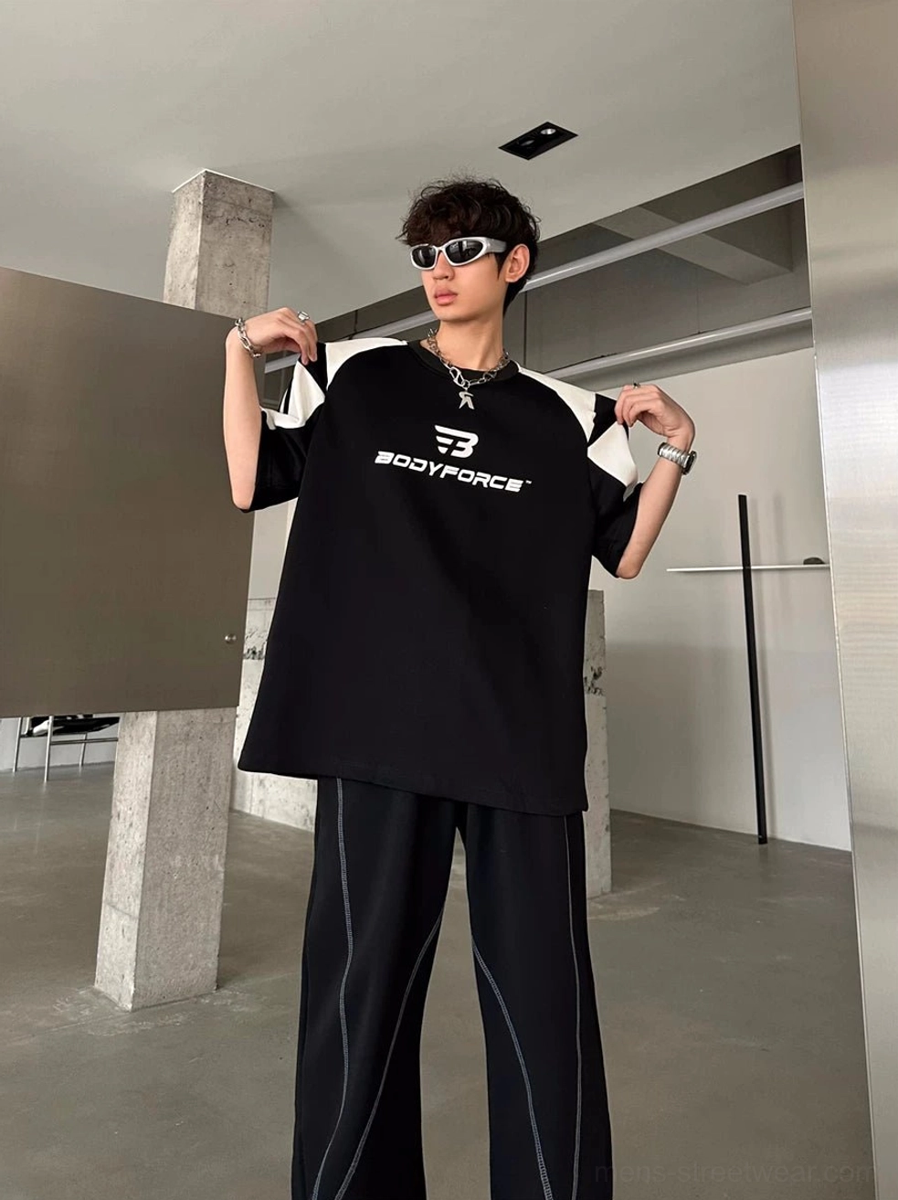 Relaxed colorblock streetwear t-shirt with contrast panels and varsity-inspired sleeve details