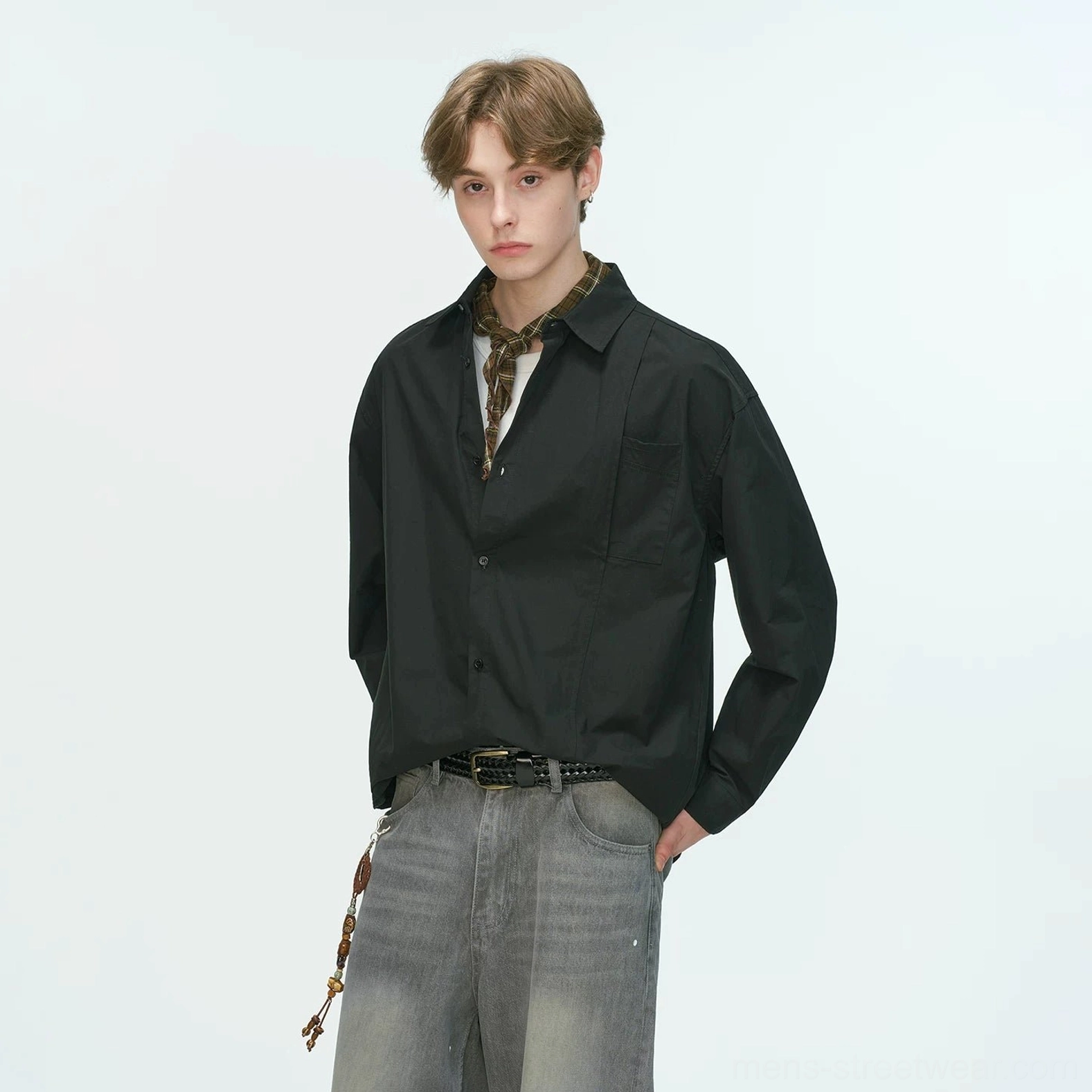 Relaxed cotton shirt with rollable sleeves for casual layering and refined East Asian streetwear styling