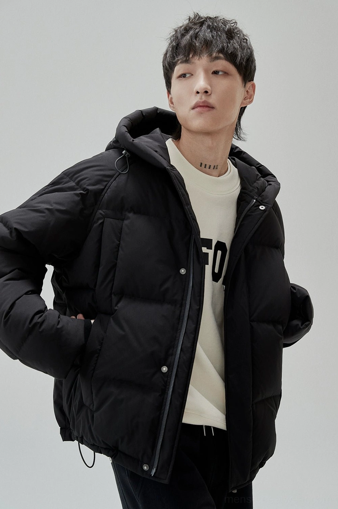 Relaxed crewneck sweatshirt with tactile chest print and understated vintage urban aesthetic