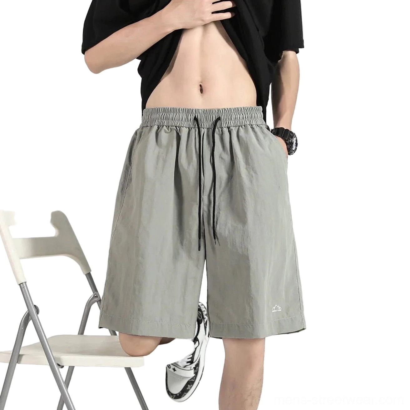 Grey relaxed streetwear utility shorts with side pockets elastic drawstring waist and embroidered mountain logo