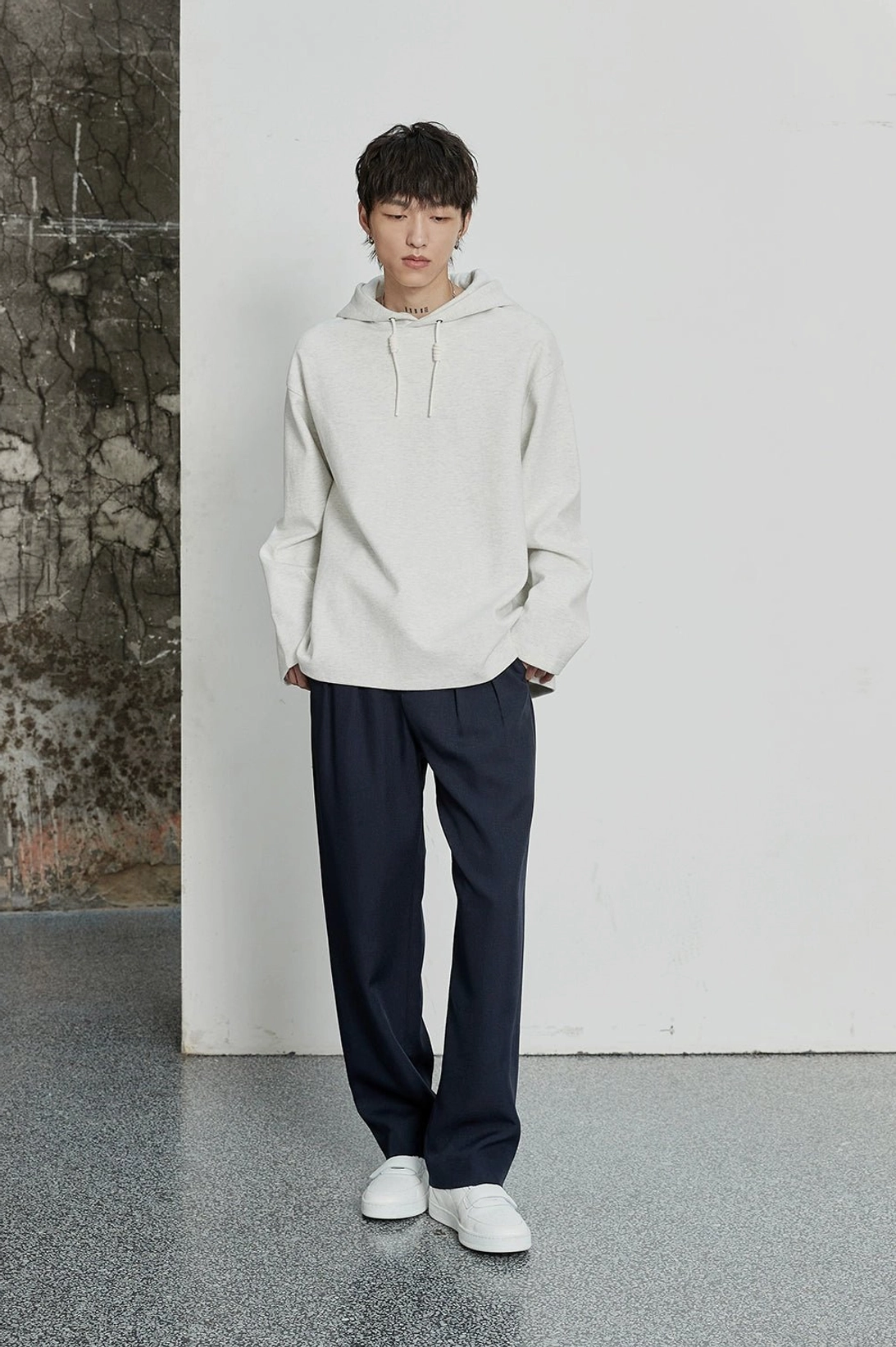 Relaxed fit double-pleated trousers for Korean streetwear and smart casual outfits