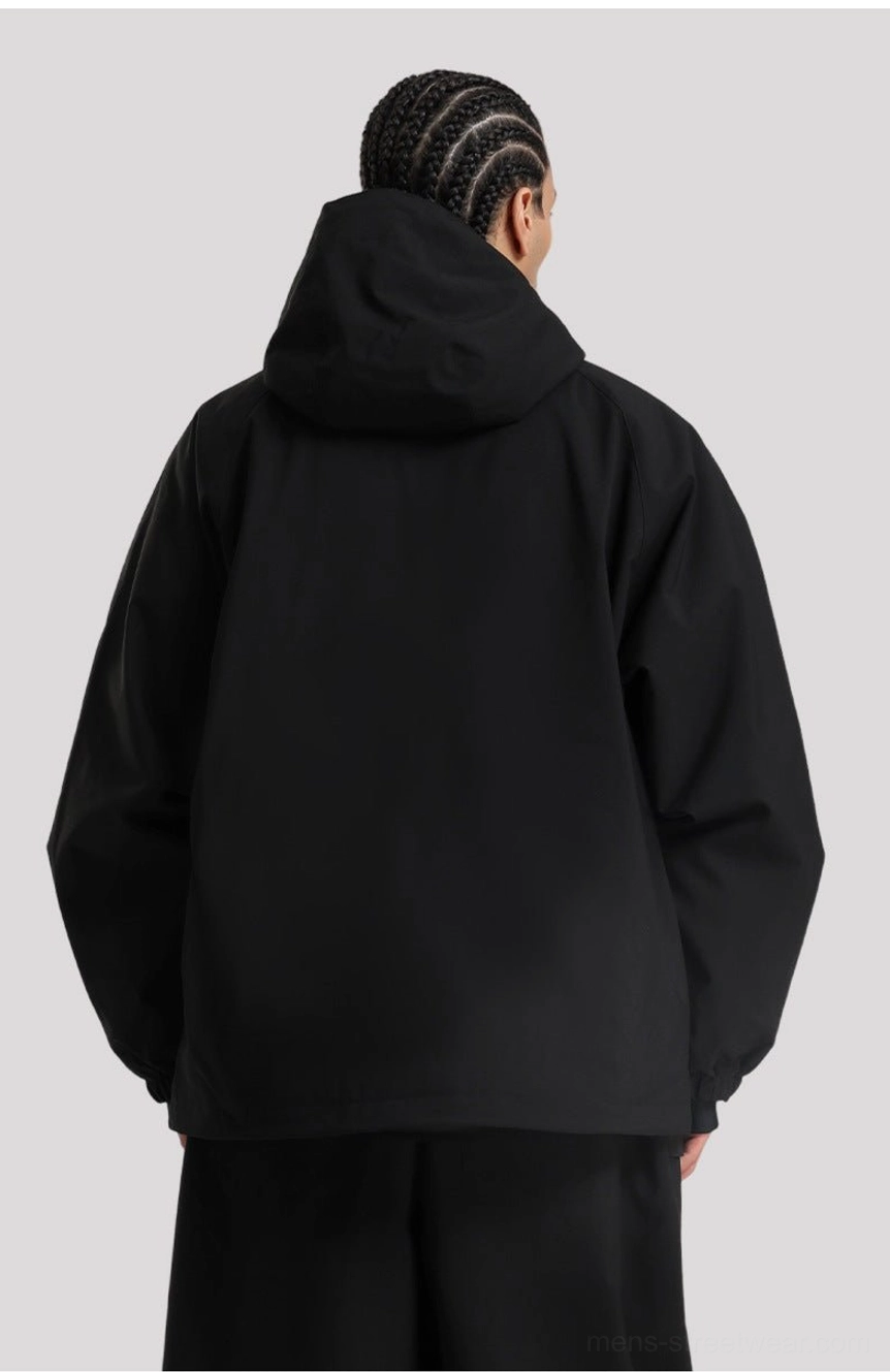 Relaxed fit outdoor shell jacket for snowboarding and winter streetwear, featuring a tall chin guard and adjustable hood