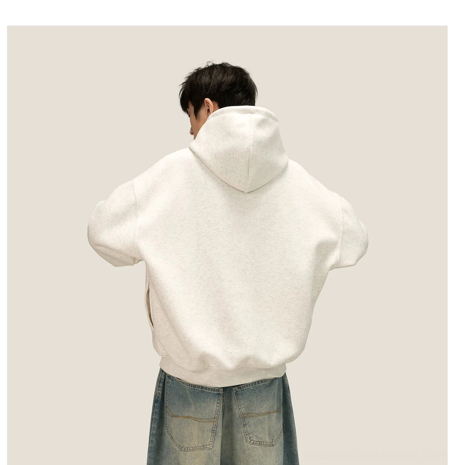 Relaxed fleece pullover hoodie with roomy hood and dropped shoulder design for everyday streetwear