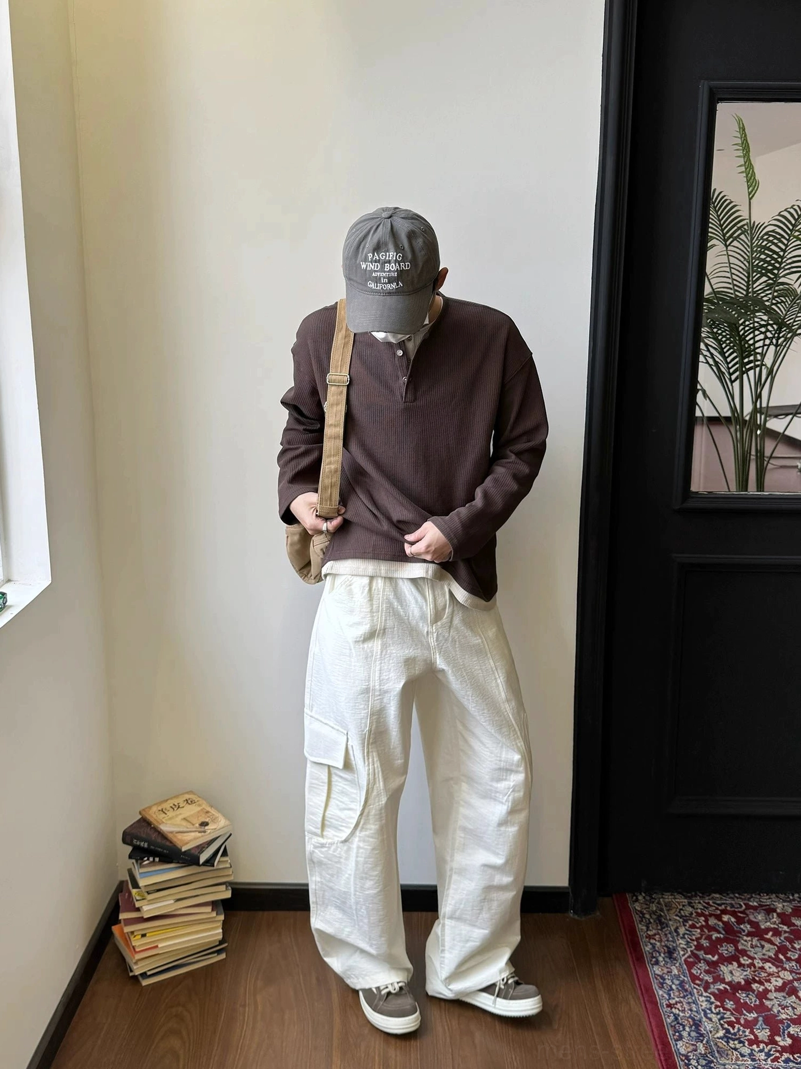 Relaxed Henley collar shirt with waffle texture, long sleeves and easy everyday urban styling