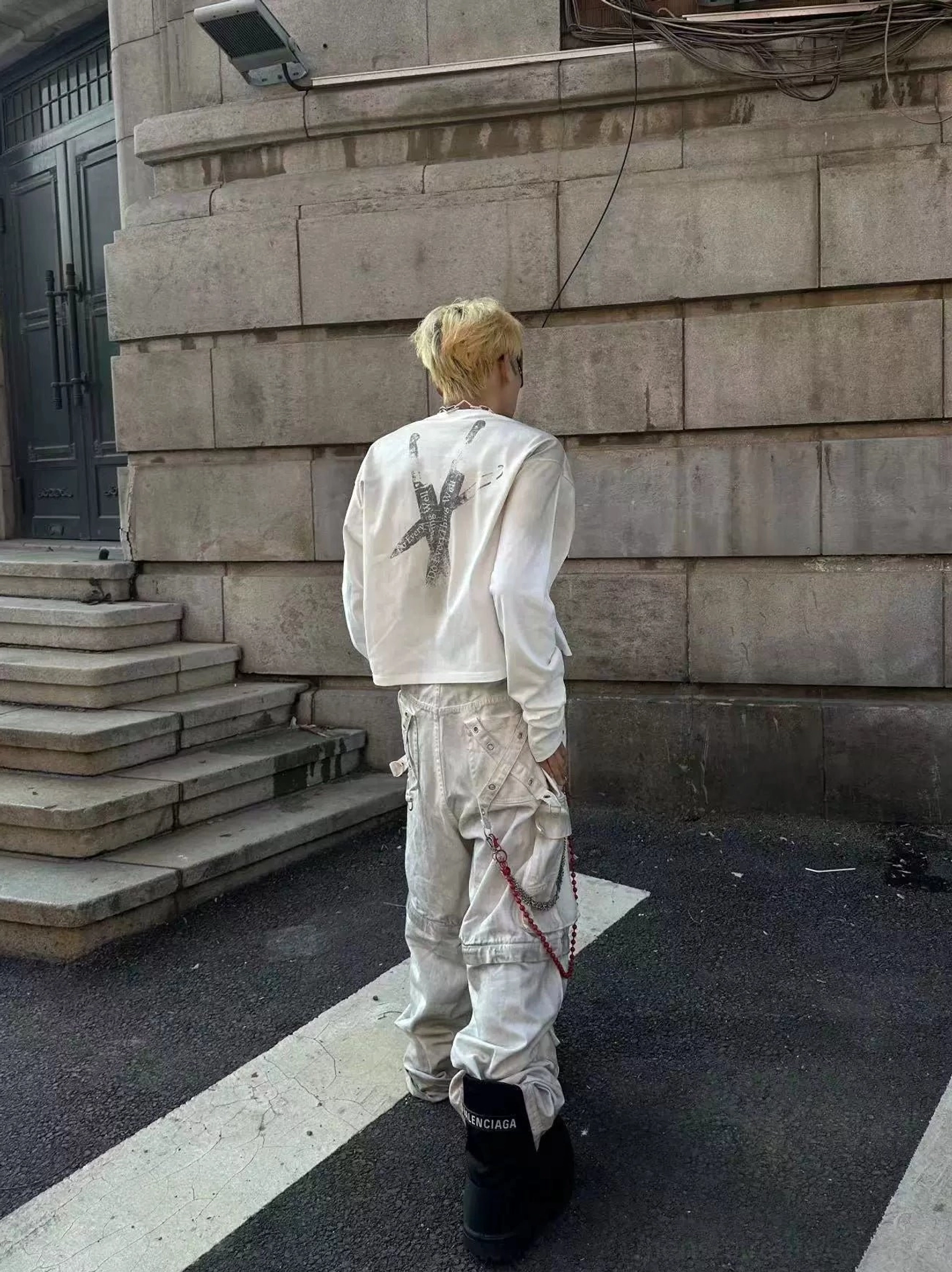 Relaxed ivory streetwear long sleeve shirt back view featuring large distressed crossed blade graphic