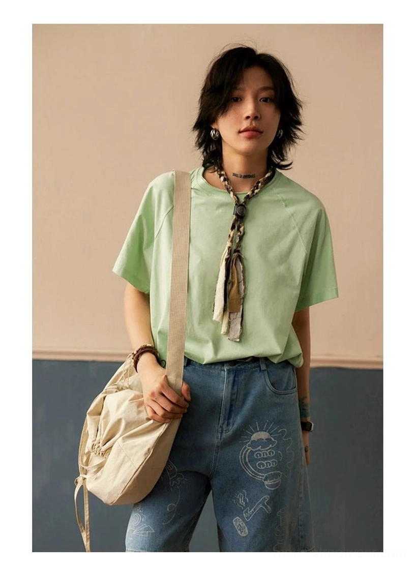 Relaxed Korean fashion raglan sleeve tee made from breathable cotton for warm-weather urban outfits