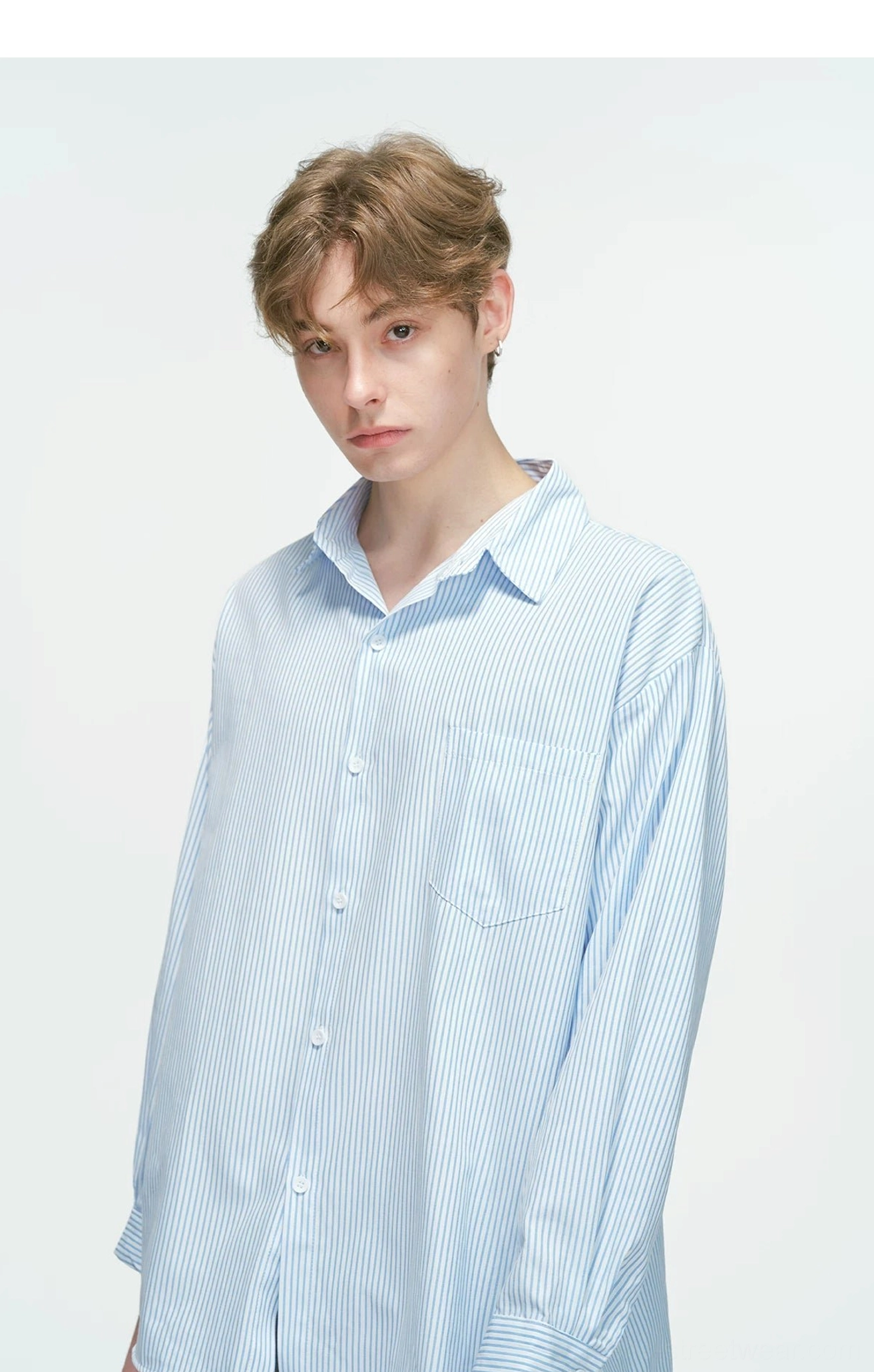 Relaxed oversized vertical stripe shirt designed for Seoul-inspired streetwear layering and modern casual outfits
