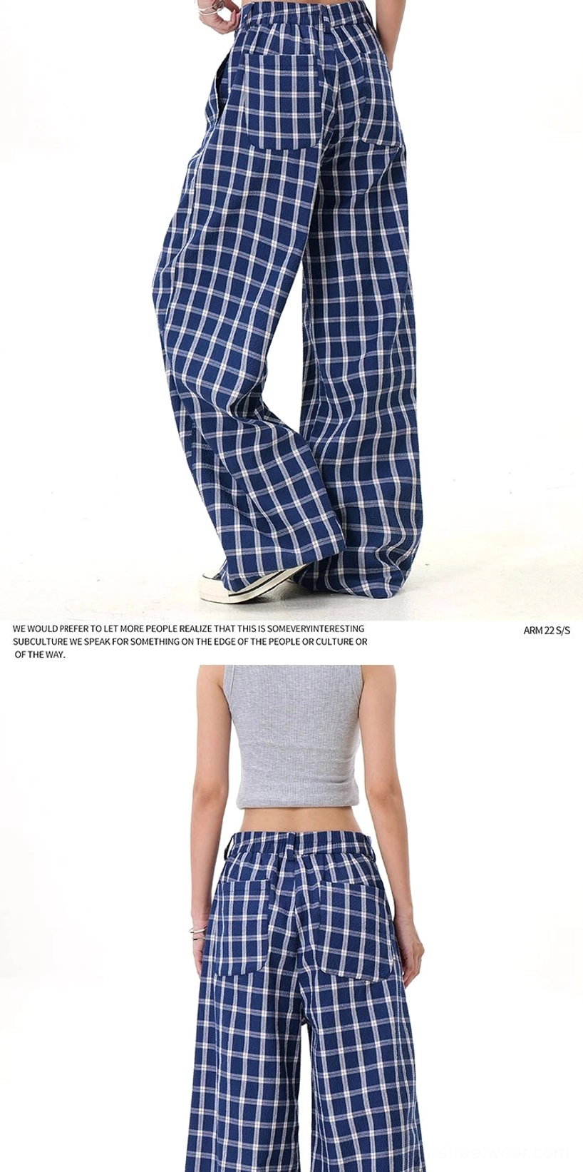Fashion detail image of relaxed plaid wide-leg trousers with high waist, wide leg drape, and contemporary Korean streetwear attitude