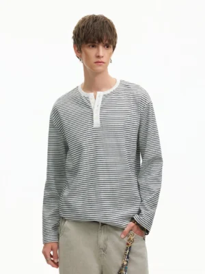 Gray and white striped Henley long sleeve tee in a relaxed Korean streetwear fit with khaki loose trousers