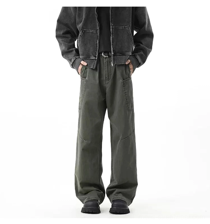 Relaxed wide-leg cargo trousers with workwear-inspired patch pockets, full-length cut, and modern urban streetwear styling