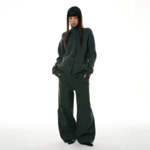 Front full-body streetwear outfit featuring relaxed wide-leg workwear denim pants paired with an oversized gray knit cardigan