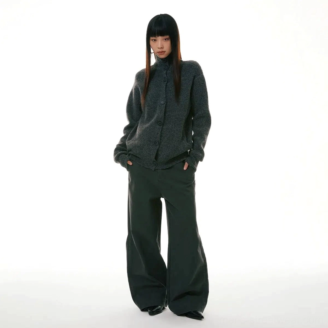 Front full-body streetwear outfit featuring relaxed wide-leg workwear denim pants paired with an oversized gray knit cardigan