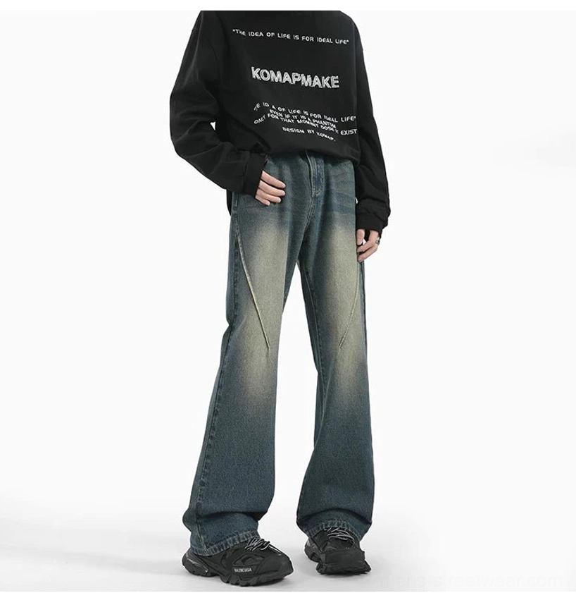 Retro Blue arc flare jeans product view featuring vintage fading, extended length, and chunky sneaker-ready wide-leg fit