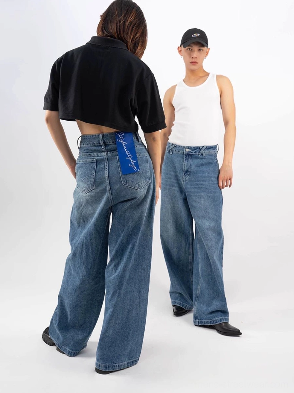 Retro blue oversized wide-leg denim jeans rear view showing vintage wash back pockets and loose streetwear silhouette