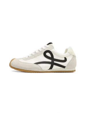 Retro breathable panel sport sneakers in white and grey with black abstract side detail and gum rubber outsole displayed on a clean background