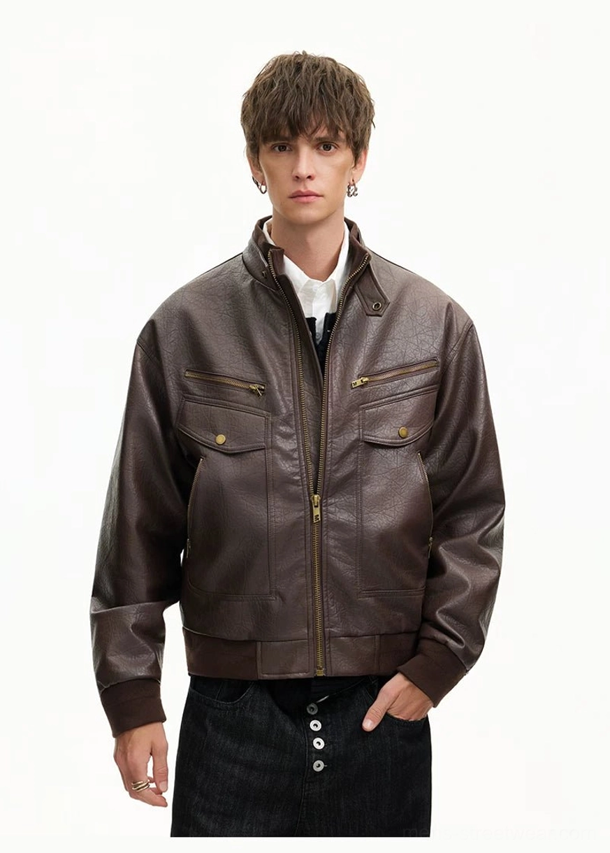 Brown retro moto bomber jacket front view showing stand collar textured faux leather and pocket layout
