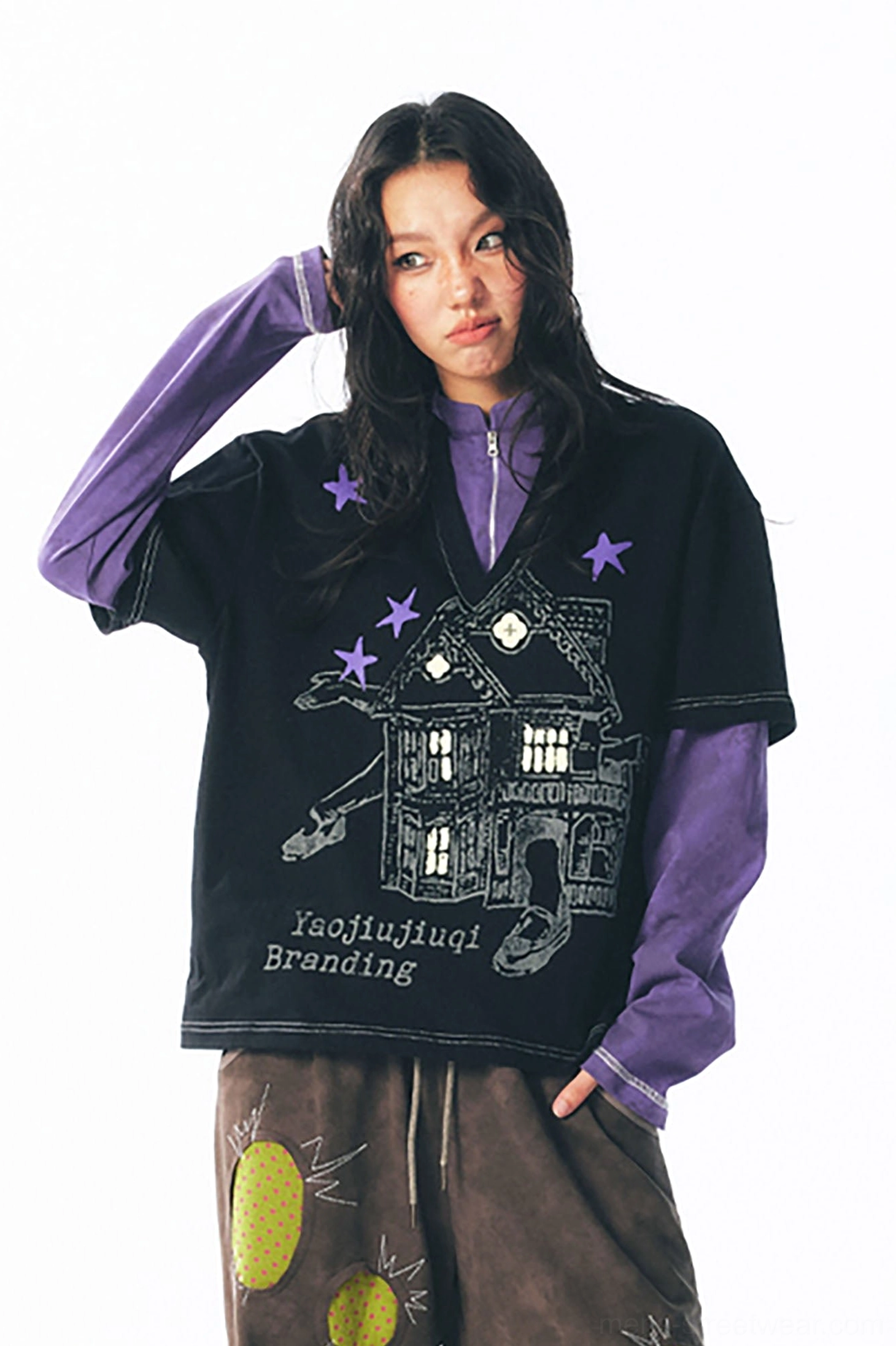 Retro layered haunted house graphic long sleeve streetwear tee styled for contemporary Korean-inspired fashion